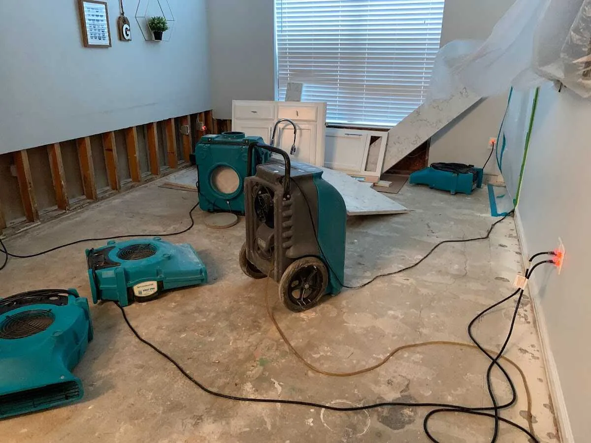 Dehumidifier in flood-cut room for Water Damage Restoration in Attalla